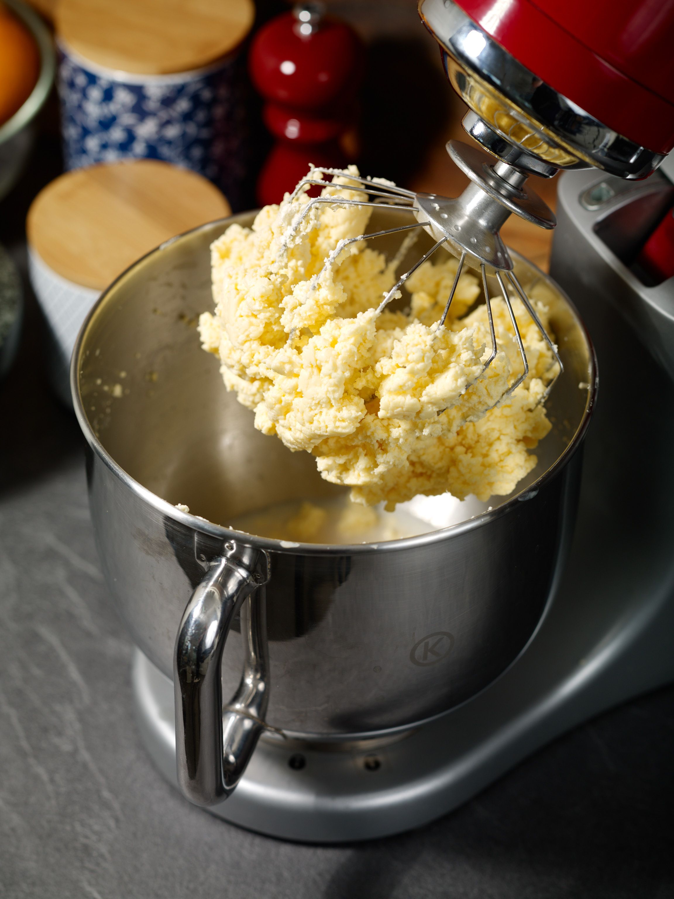 Fully churned but unwashed butter as well as buttermilk left in the mixing pot