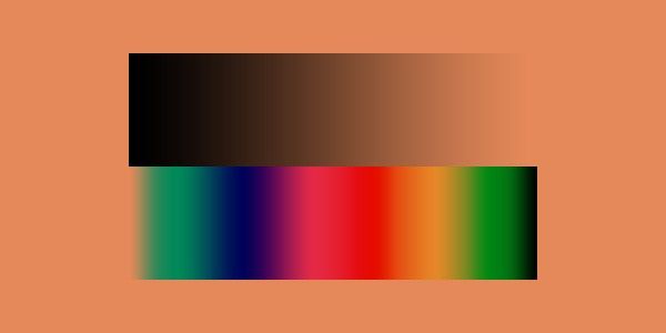 A synthetic image showing a black-to-transparent gradient as well as a color spectrum on an orange background